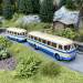 Bus Jelcz 043 Crème/Bleu + Remorque-HO-1/87-Starline Models 58265