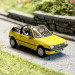 Peugeot 205 cabriolet jaune genet, avec conducteur - SAI 1637 - 1/87