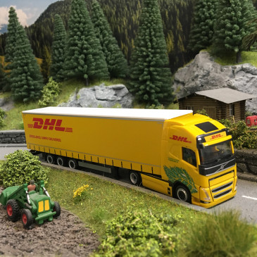 Semi-remorque à rideaux coulissants électrique Volvo FH GL XL Lowliner, DHL - HERPA 318952 - HO 1/87