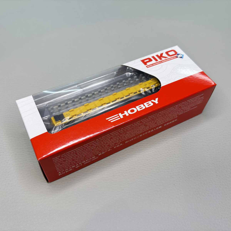 Wagon plat à rebords bas à ranchers avec chargement rails, RLF - PIKO 27734