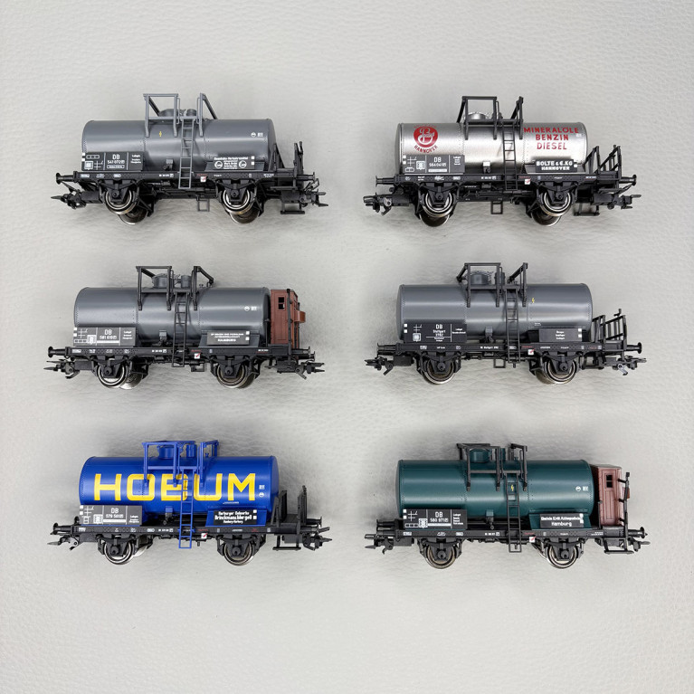 6 wagons citernes courts, 2 essieux, "BP, DEA, HOBUM, EVA, BOLTE",DB - TRIX 24170