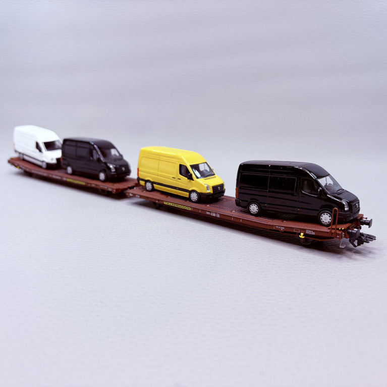 2 wagons plats jumelés, type Laads 800B, transport de véhicules, Transwaggon - TRIX 24428