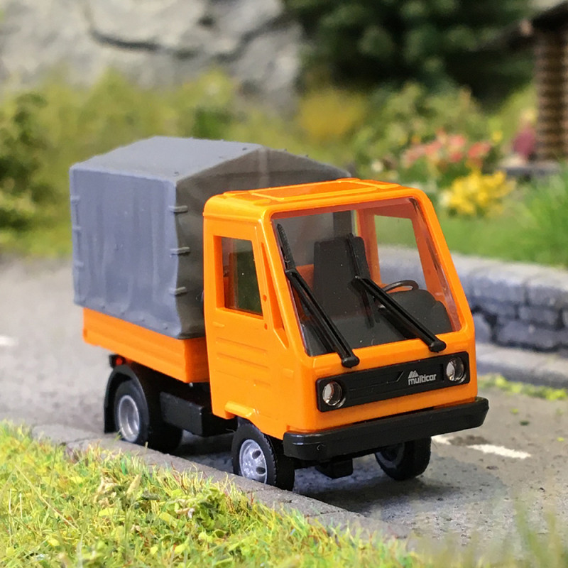 Multicar M26, avec plateau et bâche, orange - BUSCH 42253 - HO 1/87
